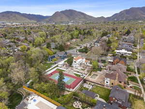 View of property location with a mountain backdrop and nearby suburban area