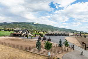View of mountain background featuring rural landscape