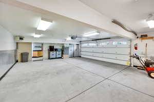 Garage featuring a heating unit