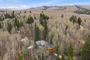 View from above of property featuring a mountain backdrop