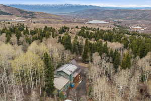 View of subject property with a mountain backdrop