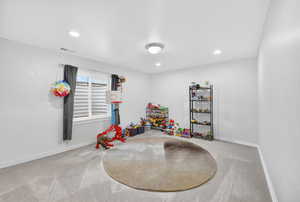 Rec room with carpet and recessed lighting