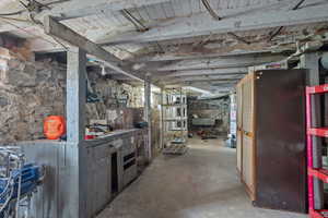 Unfinished below grade area with gas water heater