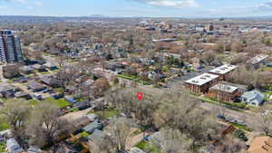 Aerial view of property's location with nearby suburban area