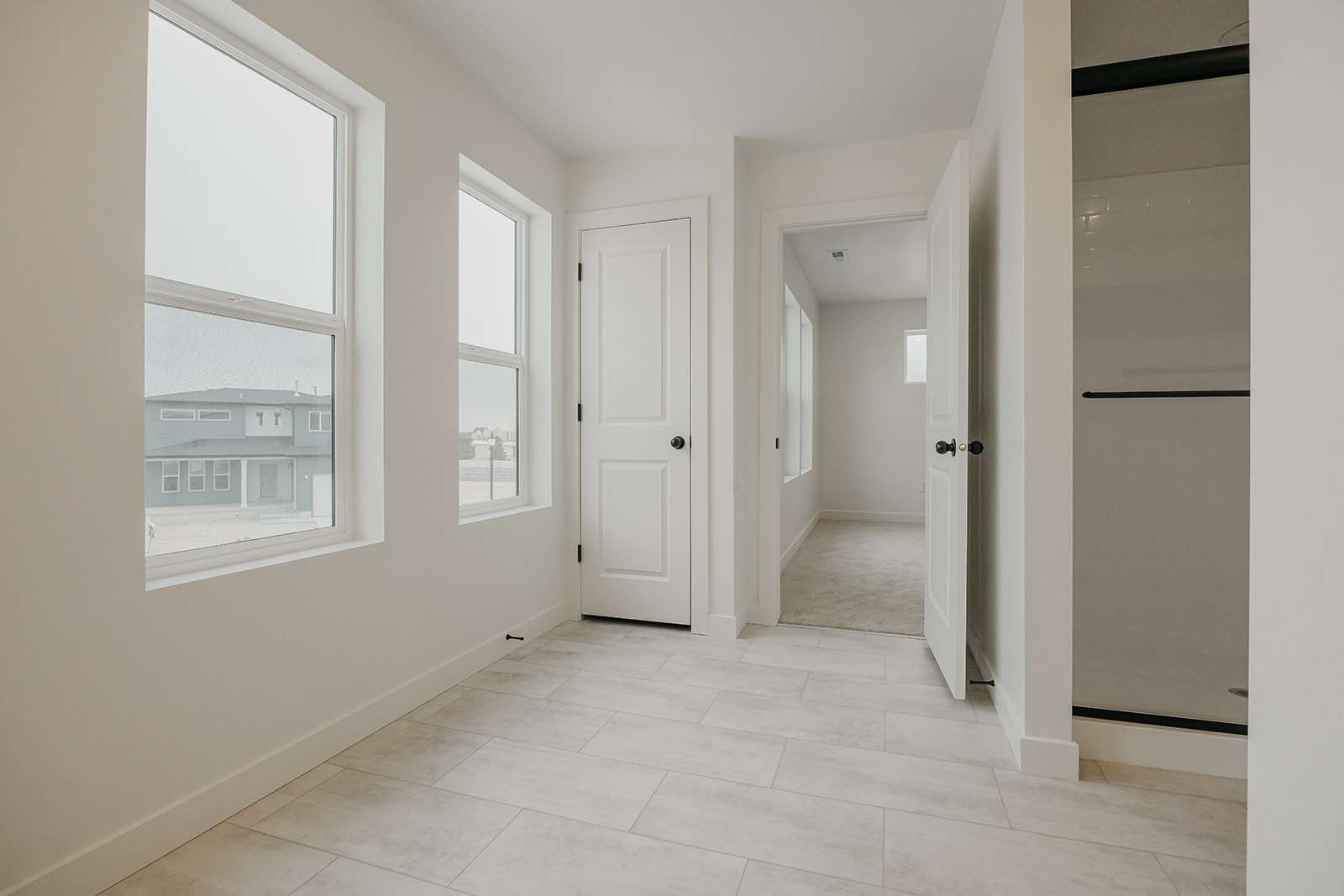Corridor featuring baseboards