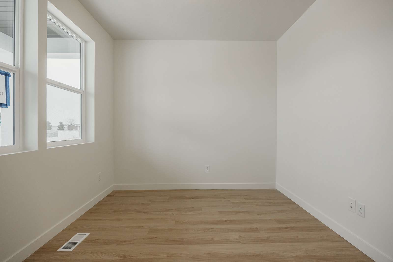 Unfurnished room featuring light wood finished floors
