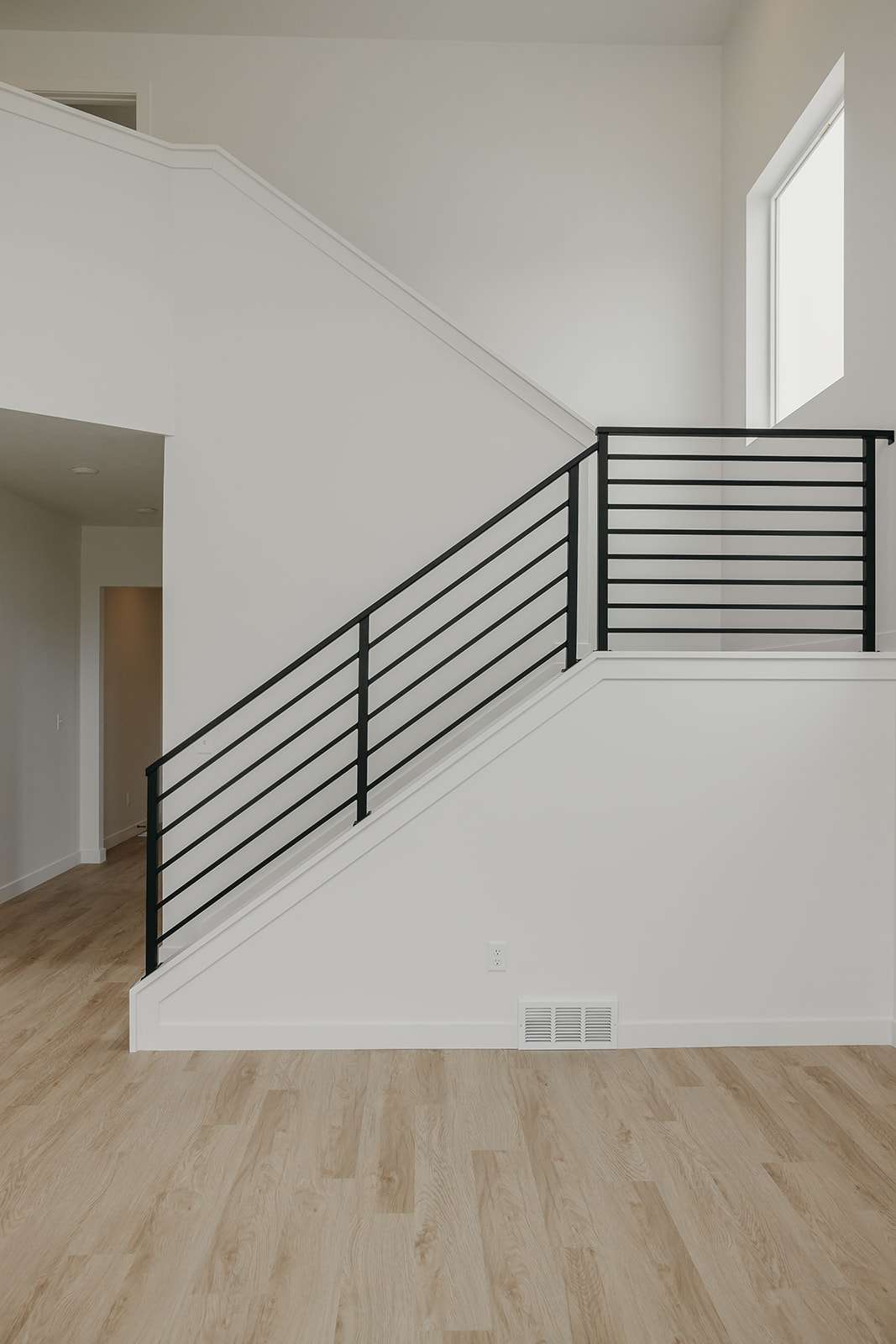 Staircase with wood finished floors