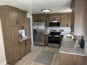 Pantry-type cabinet and tile backsplash