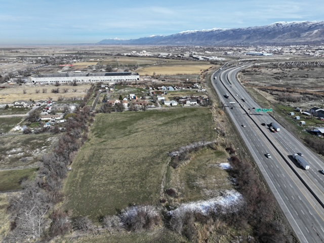 View of property location featuring a mountainous background and rural landscape