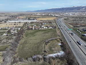 View of property location featuring a mountainous background and rural landscape