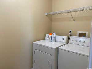 Laundry area with separate washer and dryer