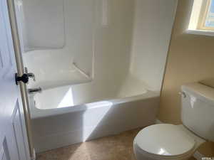 Bathroom with a shower and a tub