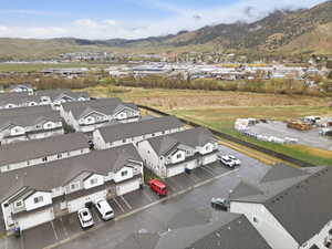 Aerial perspective of suburban area with a mountain backdrop