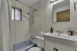 Full bathroom with vanity and shower / tub combo