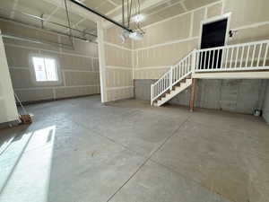 Garage featuring a garage door opener