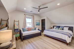 Bedroom featuring recessed lighting, light wood finished floors, and ceiling fan