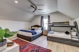 Bedroom featuring light wood-style floors, recessed lighting, and a ceiling fan