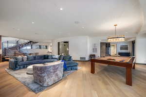 Playroom featuring light wood-type flooring, billiards table, and recessed lighting