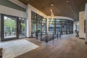 Lobby with a high wooden ceiling
