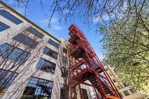 View of property featuring stairs