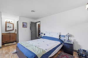 Bedroom with light wood finished floors