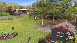View of yard featuring view of wooded area