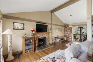 Living room featuring a fireplace and hardwood / wood-style floors
