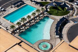 Community pool with a patio area