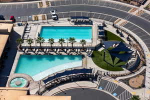 Community pool featuring a patio