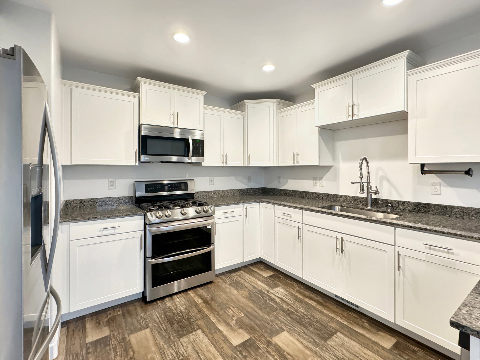 Kitchen with stainless steel appliances.