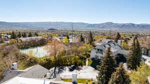 Aerial view of residential area featuring mountains