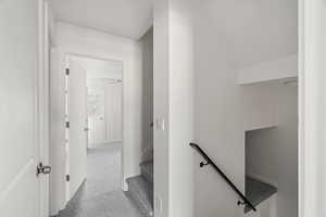 Stairs featuring carpet