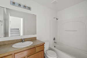 Full bath with vanity and shower / bathtub combination