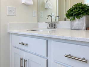 Example: Bathroom featuring double vanity