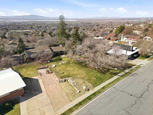 Aerial view of residential area featuring a mountain backdrop