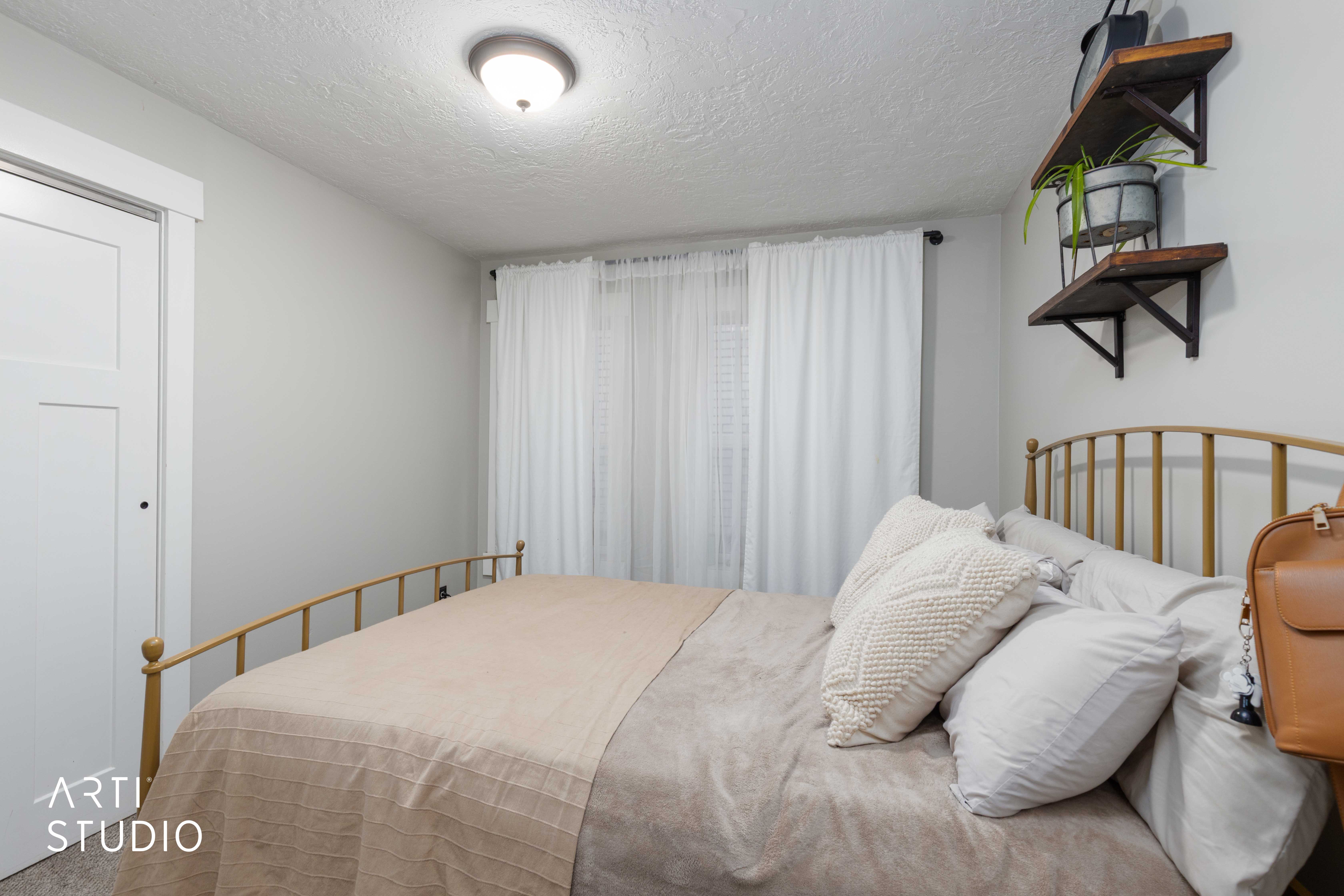 Bedroom featuring a textured ceiling
