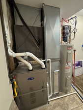 Utility room with heating unit and water heater