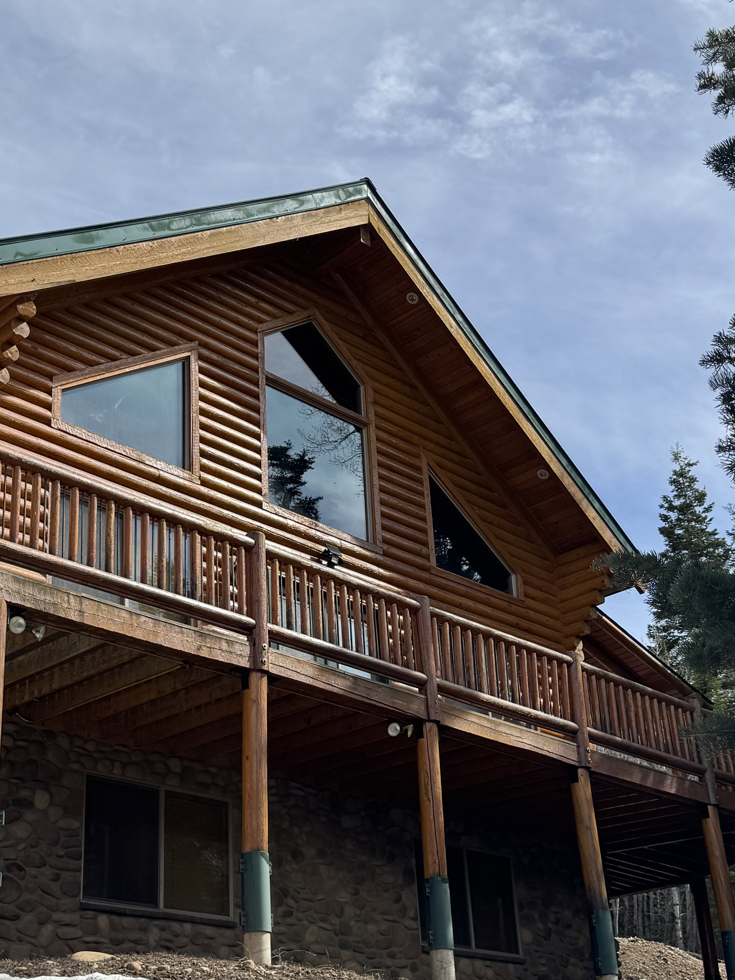 View of cabin front with deck