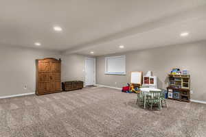 Rec room featuring recessed lighting and carpet