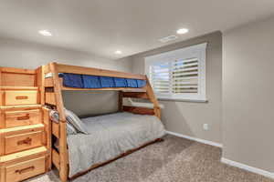 Bedroom featuring carpet flooring and recessed lighting