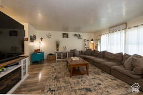 Living area with dark wood finished floors