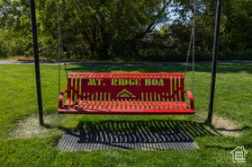 Community sign featuring a lawn