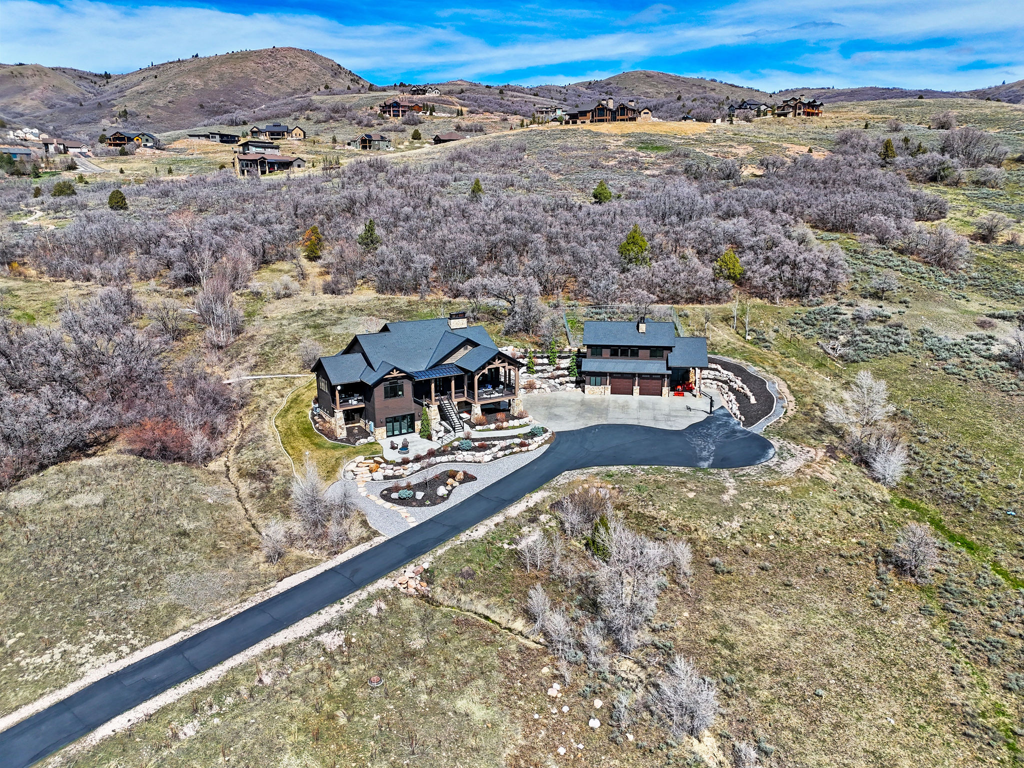 View of subject property featuring a mountain backdrop
