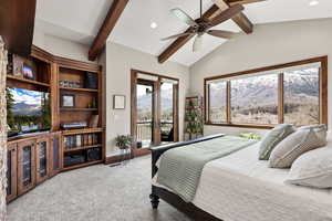 Bedroom featuring light carpet, recessed lighting, a mountain view, a ceiling fan, and access to exterior