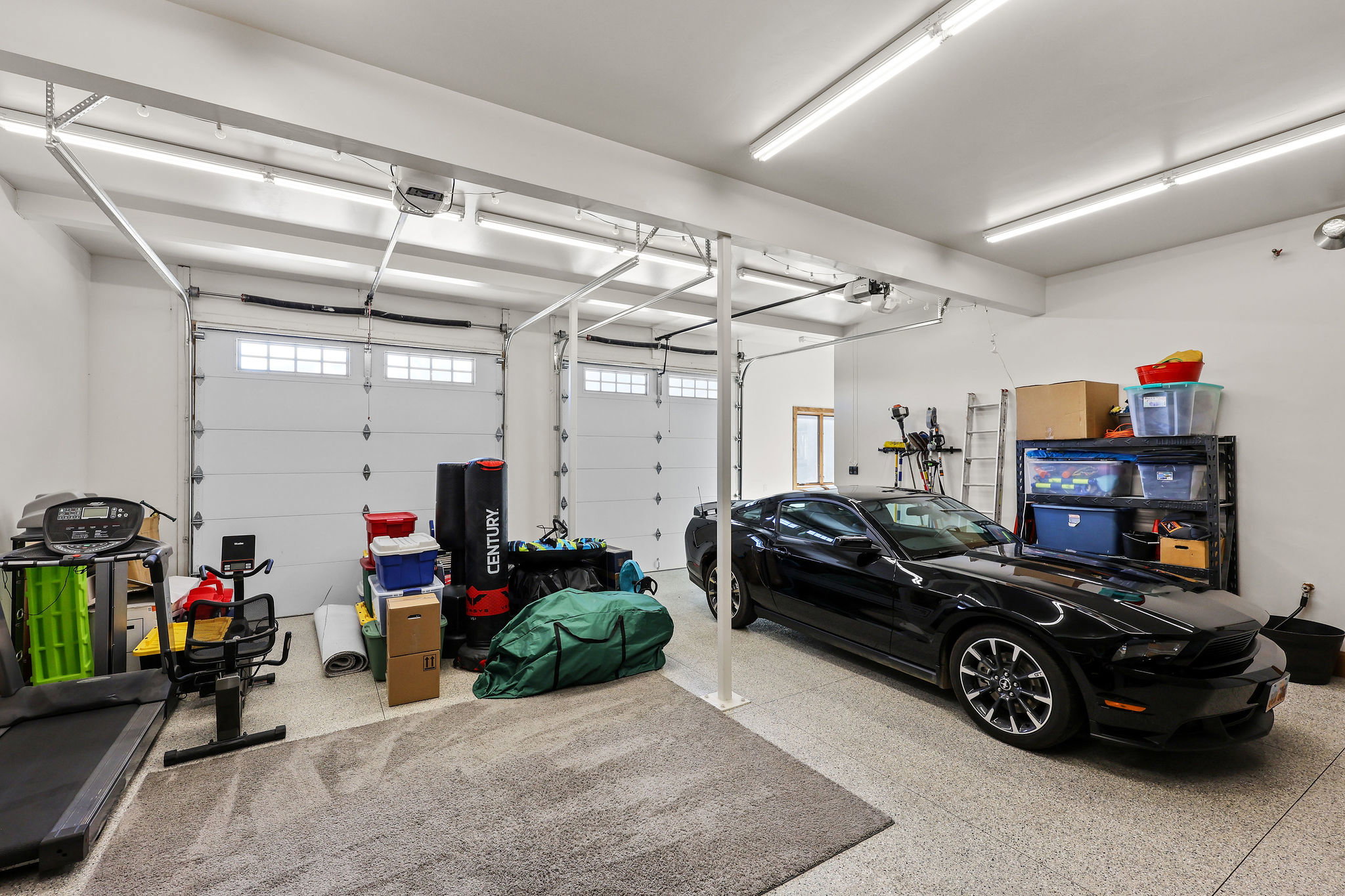 Garage featuring a garage door opener