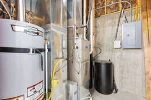 Utilities with strapped water heater and electric panel