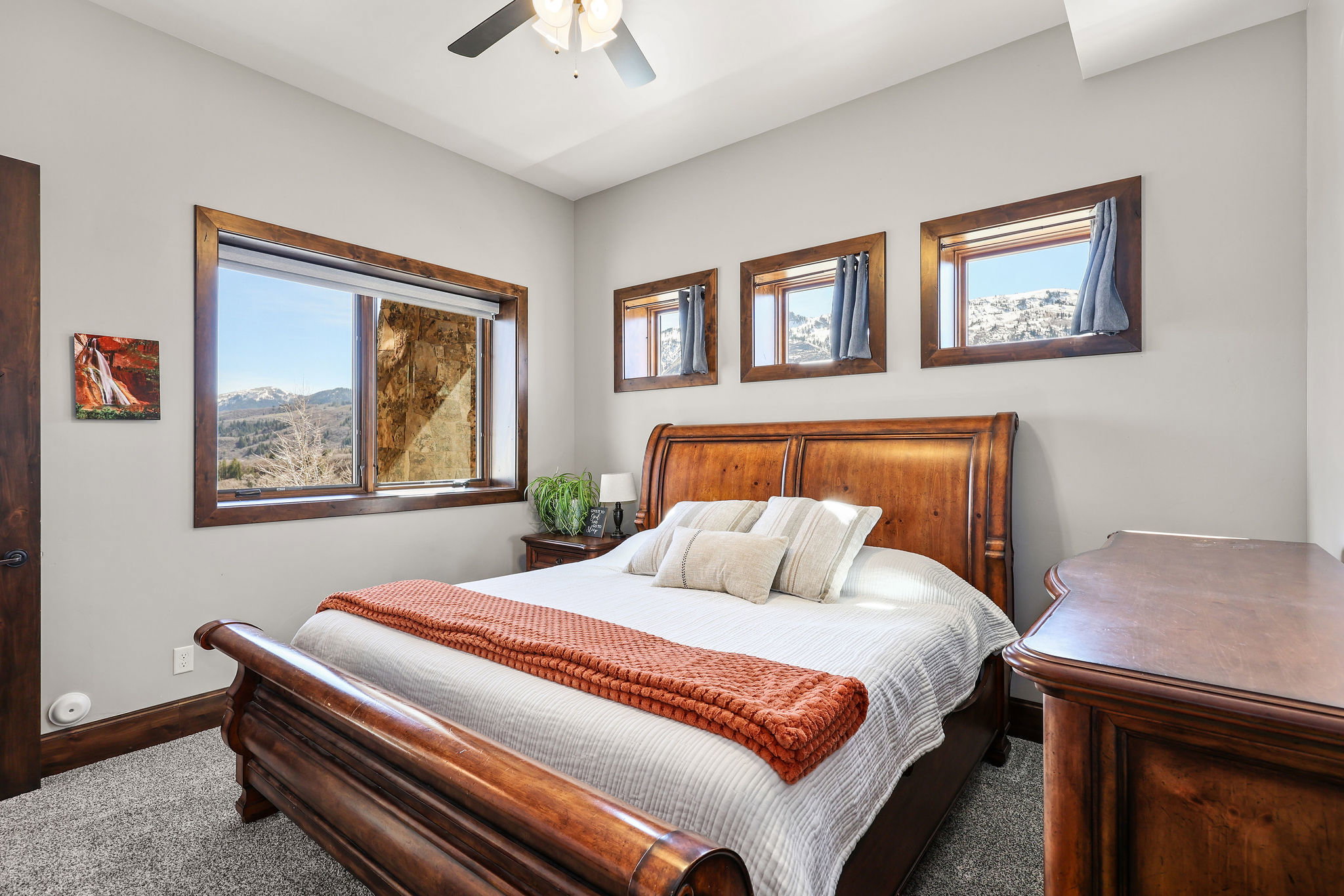 Bedroom featuring carpet floors and a ceiling fan