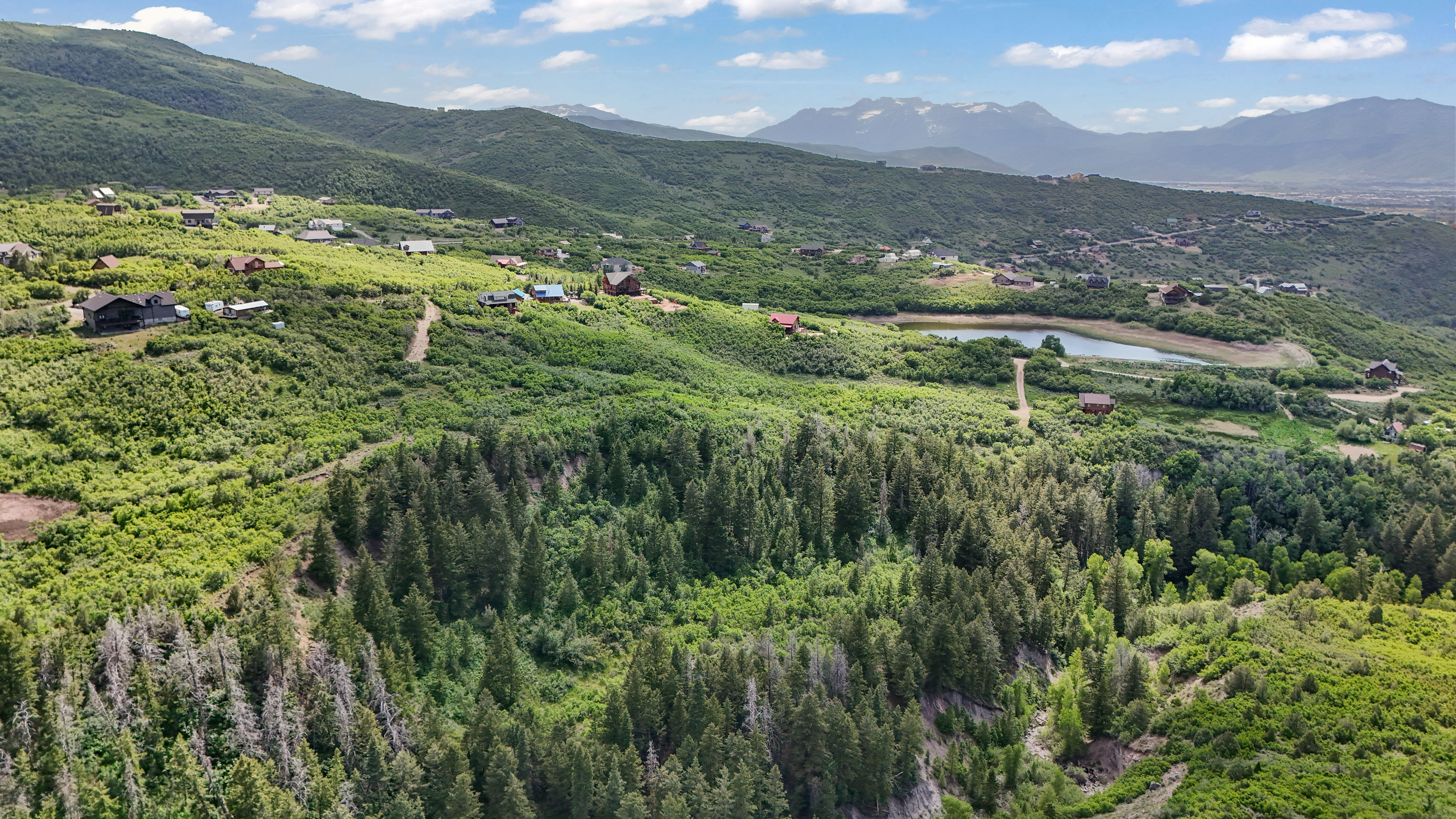 View of mountain backdrop lot with trees