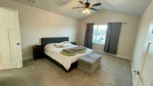 Bedroom featuring light carpet and ceiling fan