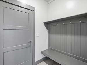 Mudroom featuring light wood-style flooring